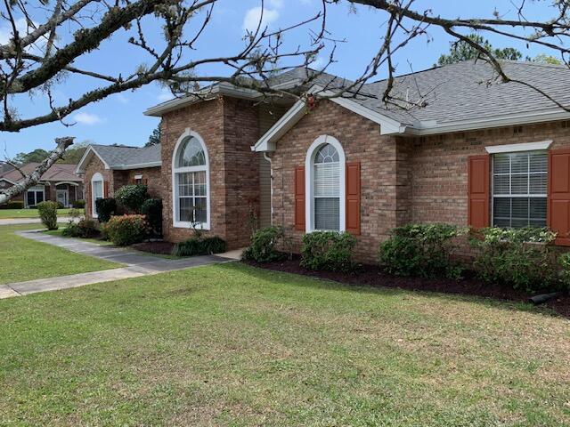 136 Gail La Rue Fort Walton Beach, FL 32547 - Photo 31 of 31 a front view of a house with garden
