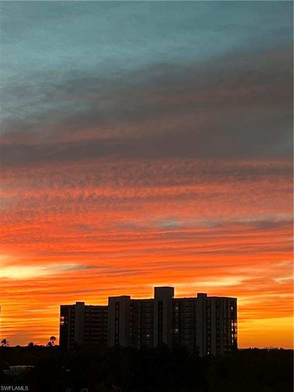 285 Grande Way, Unit 401 Naples, FL 34110 - Photo 2 of 50 a view of beach and ocean