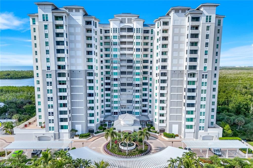 285 Grande Way, Unit 401 Naples, FL 34110 - Photo 4 of 50 a view of a tall building