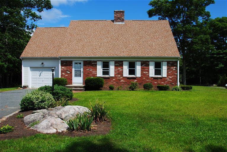 470 Delano Road Marion, MA 02738 - Photo 1 of 7 a view of a house with a yard