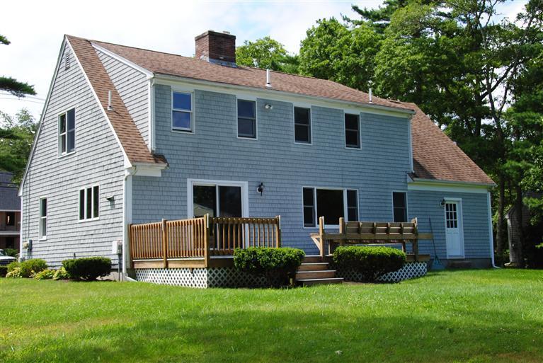 470 Delano Road Marion, MA 02738 - Photo 3 of 7 a front view of house with yard and green space