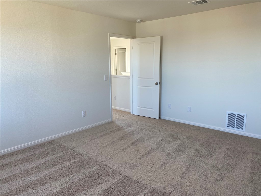 12901 Robert Lafollette Road Manor, TX 78653 - Photo 22 of 29 a view of an empty room