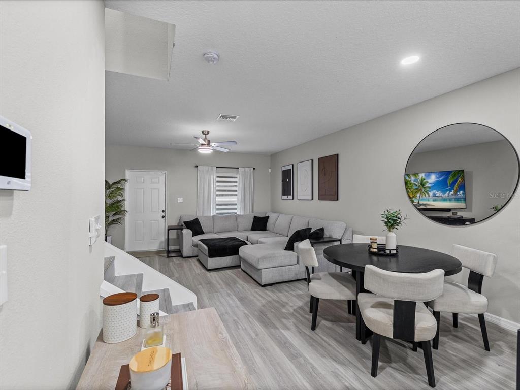 4367 Har Paul Circle Tampa, FL 33614 - Photo 11 of 31 a living room with furniture and a wooden floor