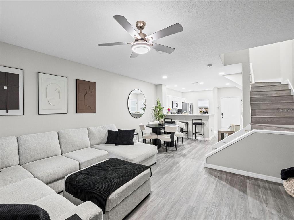 4367 Har Paul Circle Tampa, FL 33614 - Photo 14 of 31 a living room with furniture kitchen view and a large window