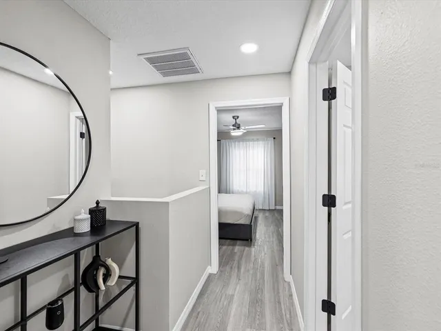 a view of a livingroom from a hallway