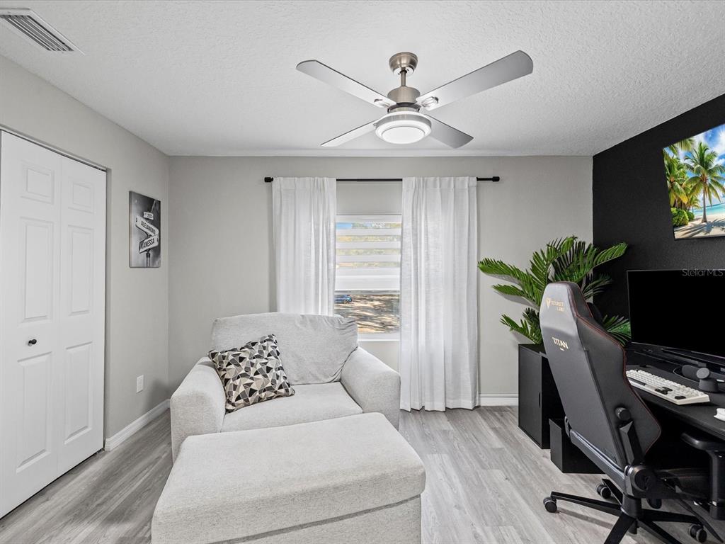 4367 Har Paul Circle Tampa, FL 33614 - Photo 21 of 31 a living room with furniture and a flat screen tv