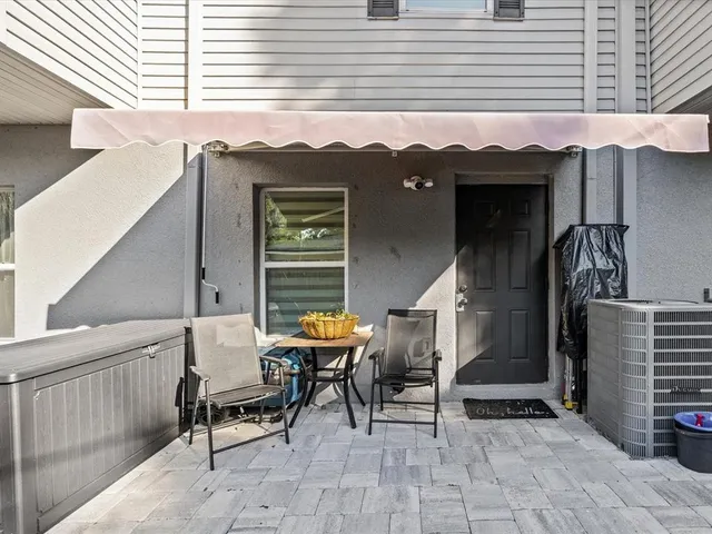 a view of a terrace with sitting area