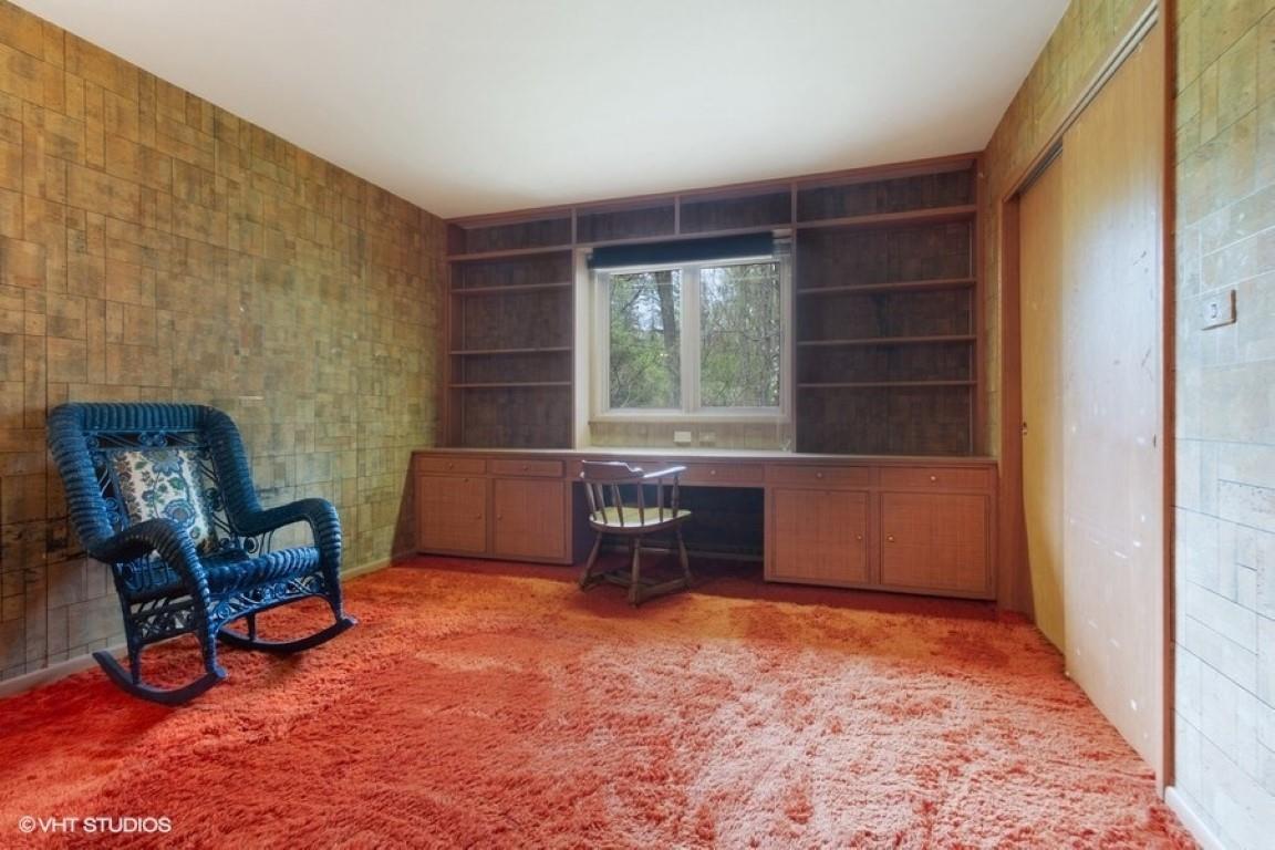 3008 Spring Creek Road Rockford, IL 61107 - Photo 16 of 24 a room with furniture and a window