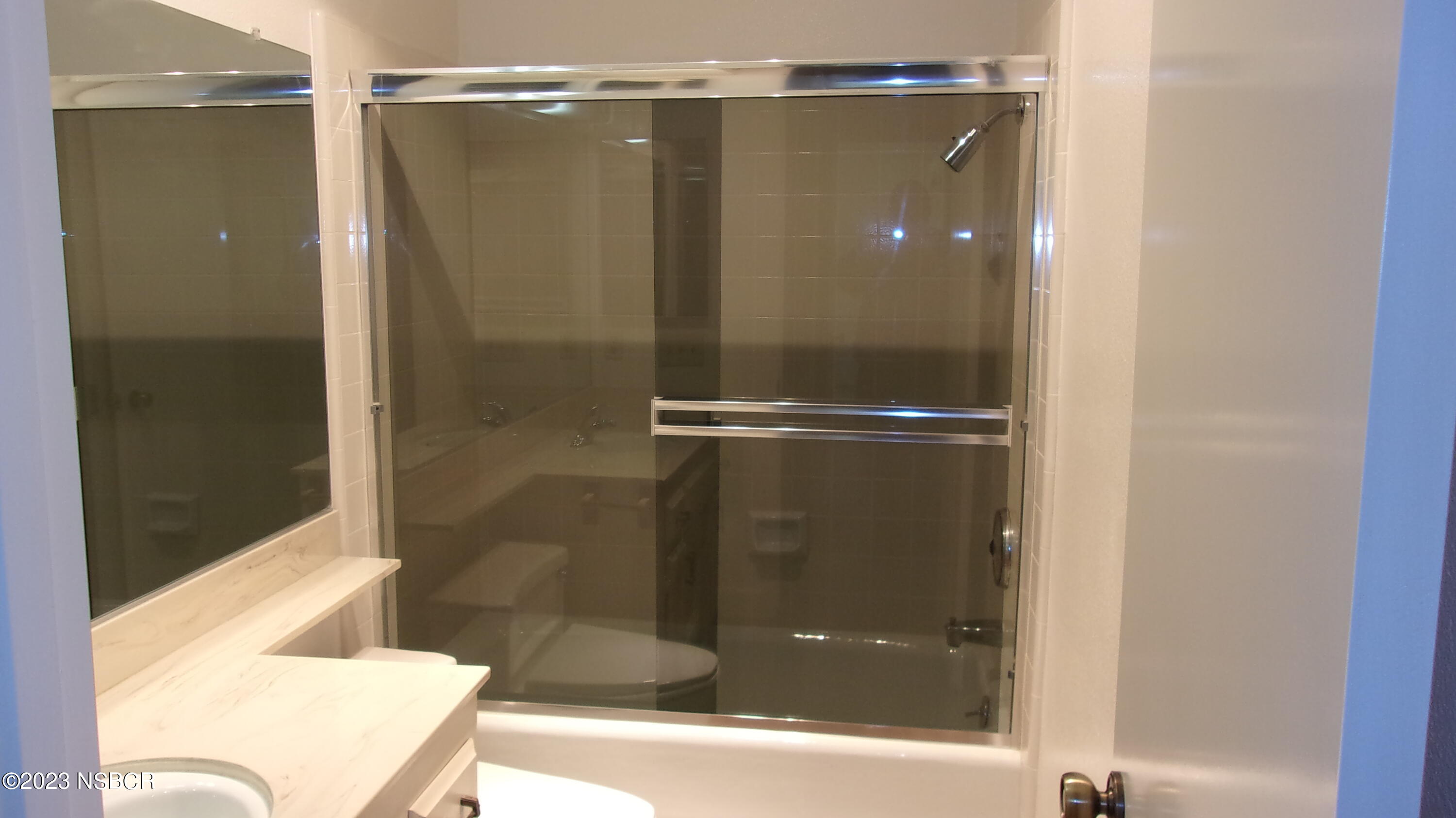 46 Stanford Circle Lompoc, CA 93436 - Photo 23 of 24 a bathroom with a shower and a toilet