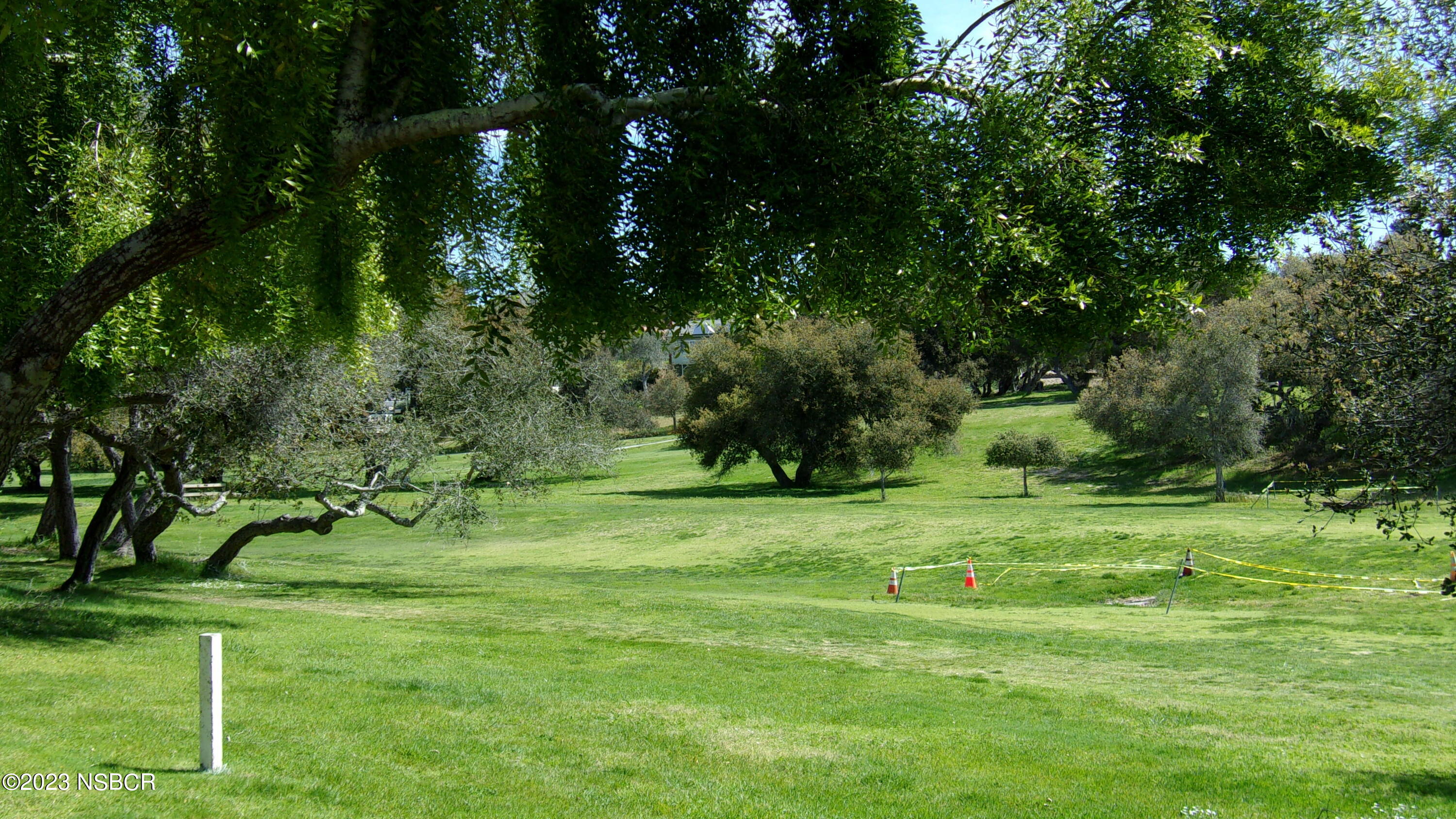 46 Stanford Circle Lompoc, CA 93436 - Photo 5 of 24 a grassy field with trees in the background