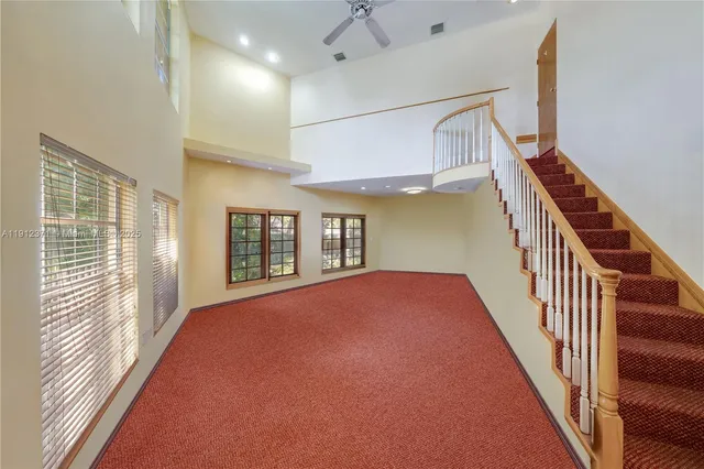 a view of an empty room with a projector