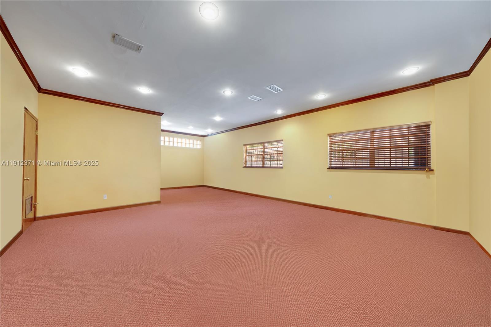 2997 Day Avenue Miami, FL 33133 - Photo 5 of 15 a view of an empty room with a projector