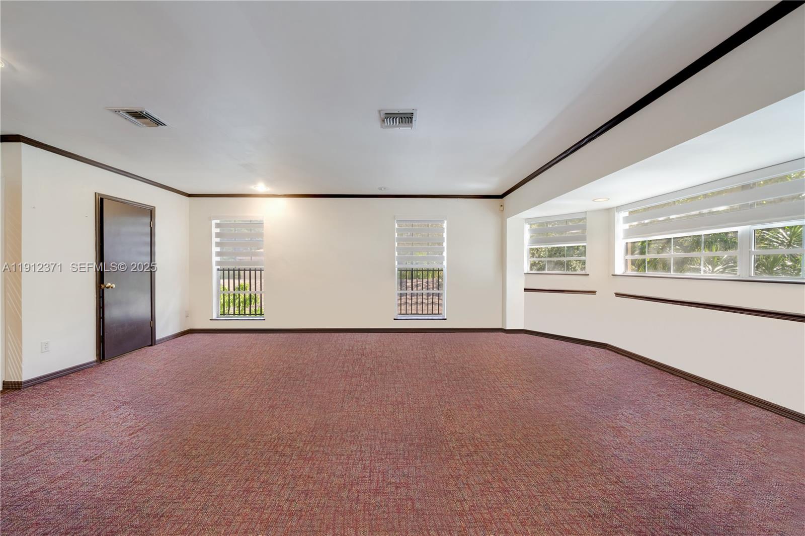 2997 Day Avenue Miami, FL 33133 - Photo 8 of 15 an empty room with windows