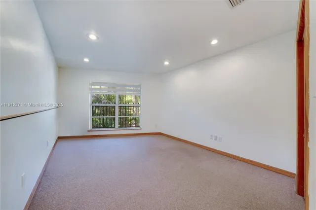 a car parked in front of a house