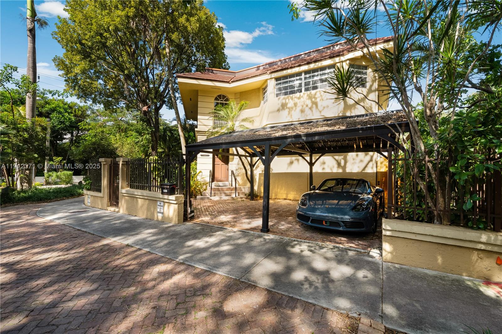 2997 Day Avenue Miami, FL 33133 - Photo 10 of 15 a car parked in front of a house