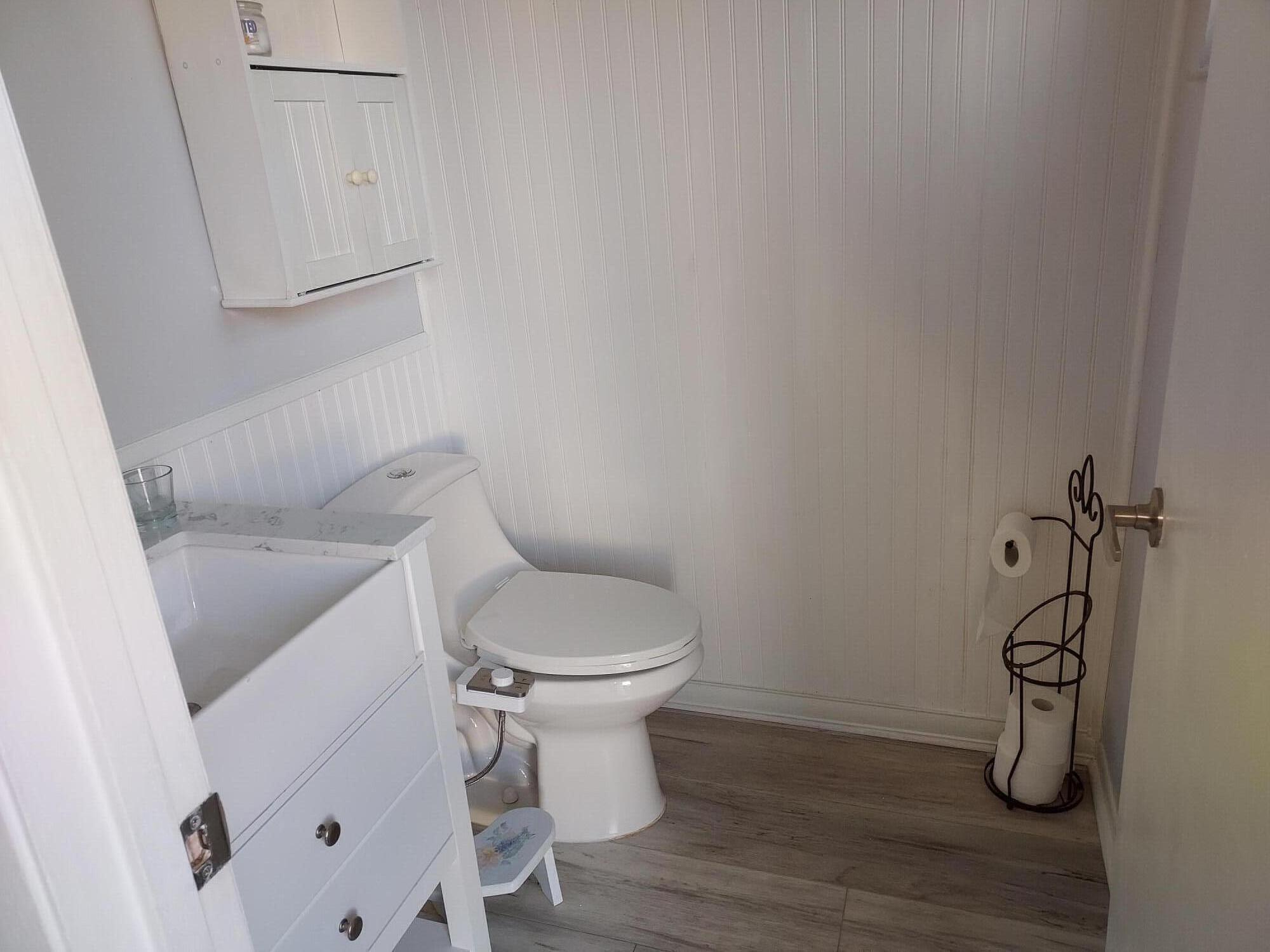 9417 South Ocean Drive, Unit 37 Jensen Beach, FL 34957 - Photo 7 of 18 a bathroom with a toilet and a sink