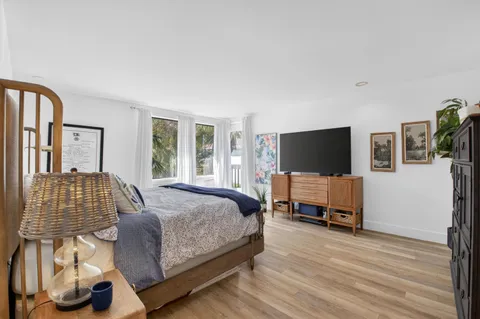 a bathroom with a shower and a toilet