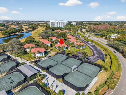 a living room with furniture a fireplace and walls