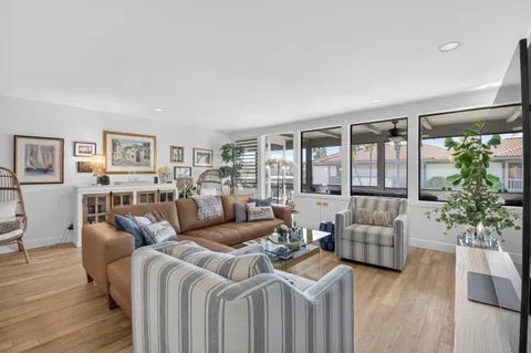 a bedroom with a bed and flat screen tv