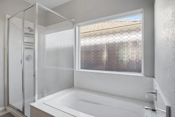 a view of a storage and utility room with a sink