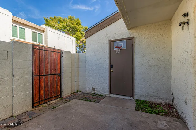 a view of a entrance gate of a house