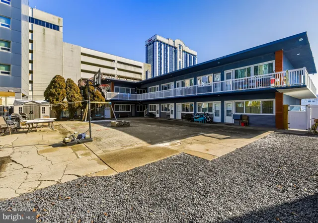 a view of a building and a yard