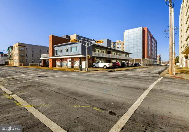 a view of a street with cars