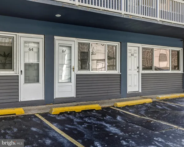 a view of a house with swimming pool and porch