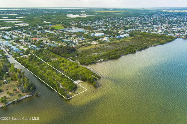 a view of a lake with a city