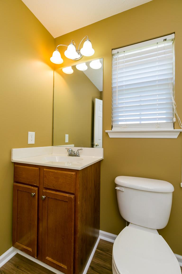 4829 Alsup Mill Road Lascassas, TN 37085 - Photo 12 of 19 a bathroom with a toilet sink and mirror