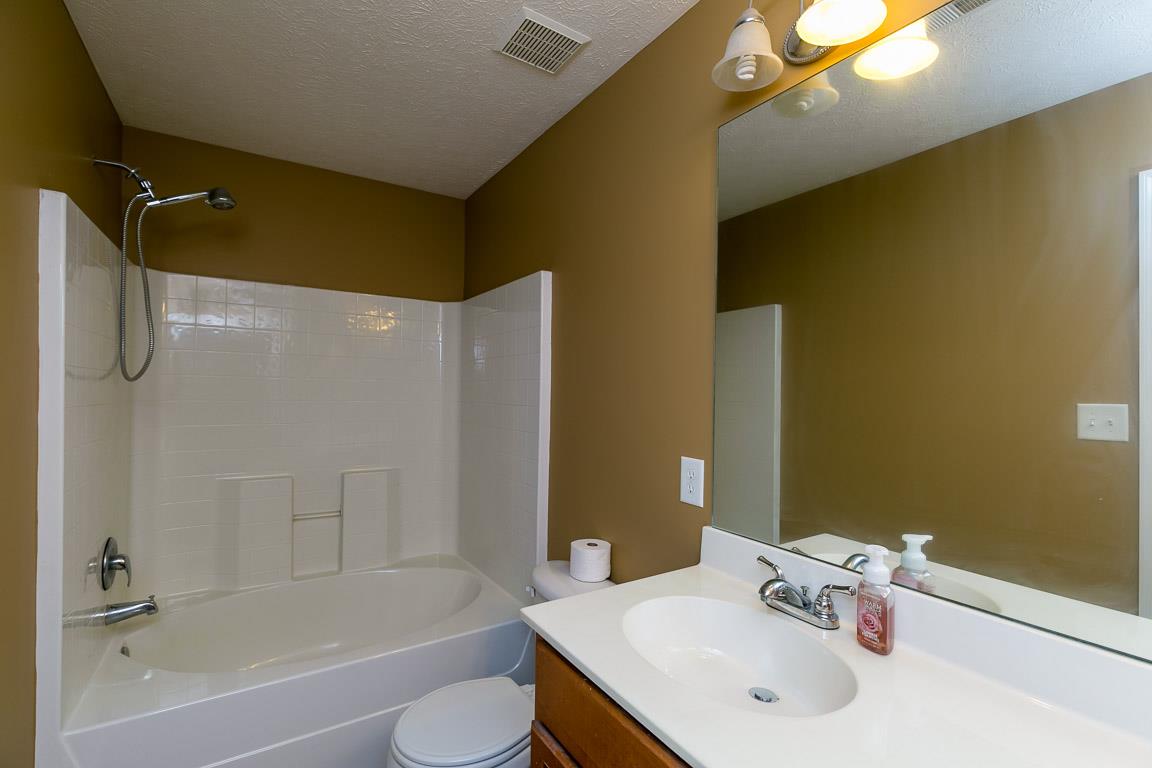 4829 Alsup Mill Road Lascassas, TN 37085 - Photo 15 of 19 a bathroom with a sink and a mirror