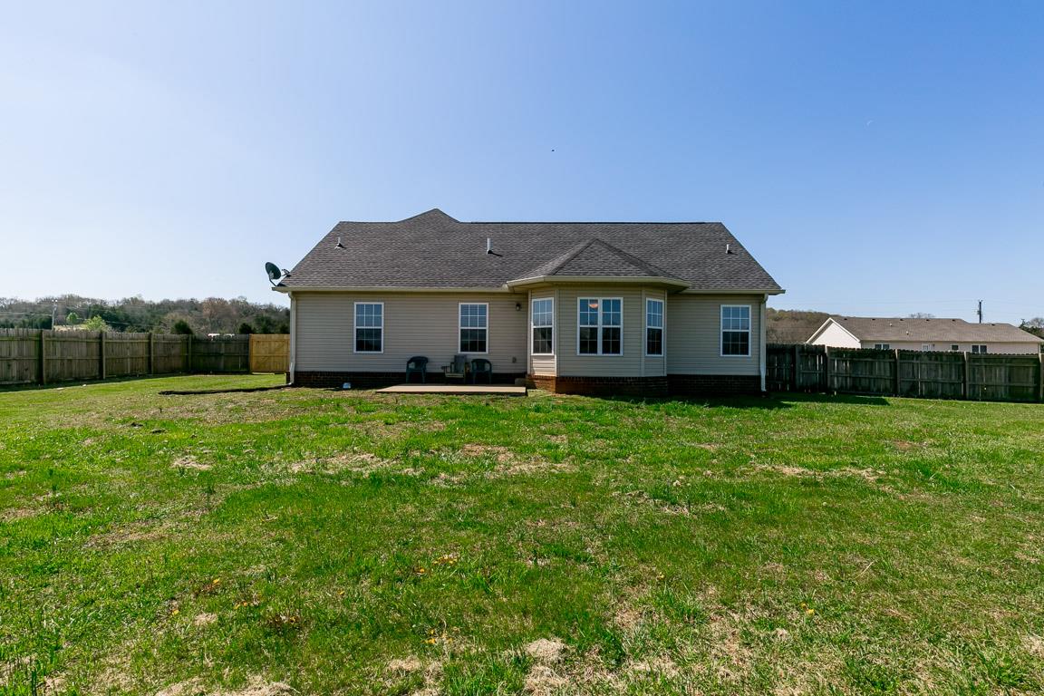 4829 Alsup Mill Road Lascassas, TN 37085 - Photo 18 of 19 a front view of a house with a garden