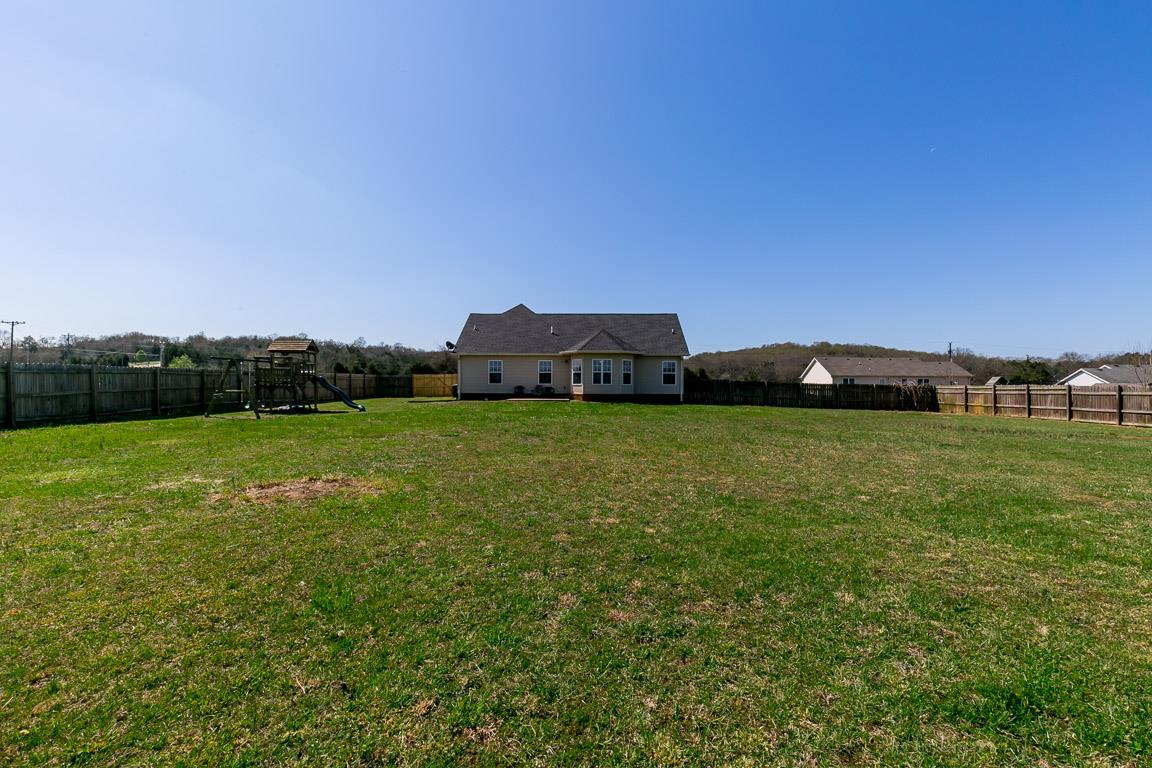 4829 Alsup Mill Road Lascassas, TN 37085 - Photo 19 of 19 a view of yard with grass & house in background