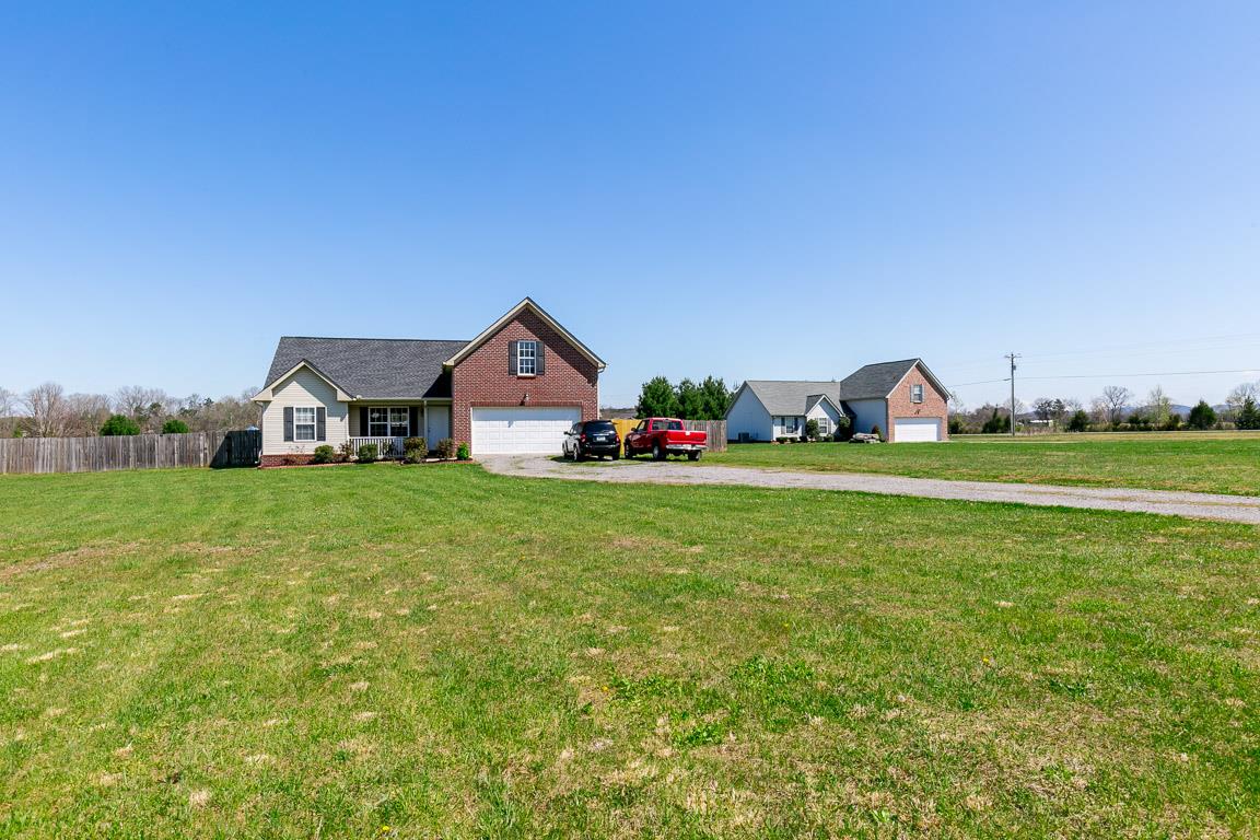 4829 Alsup Mill Road Lascassas, TN 37085 - Photo 2 of 19 a front view of a house with garden