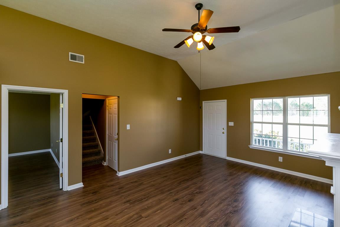 4829 Alsup Mill Road Lascassas, TN 37085 - Photo 5 of 19 wooden floor in an empty room with a window