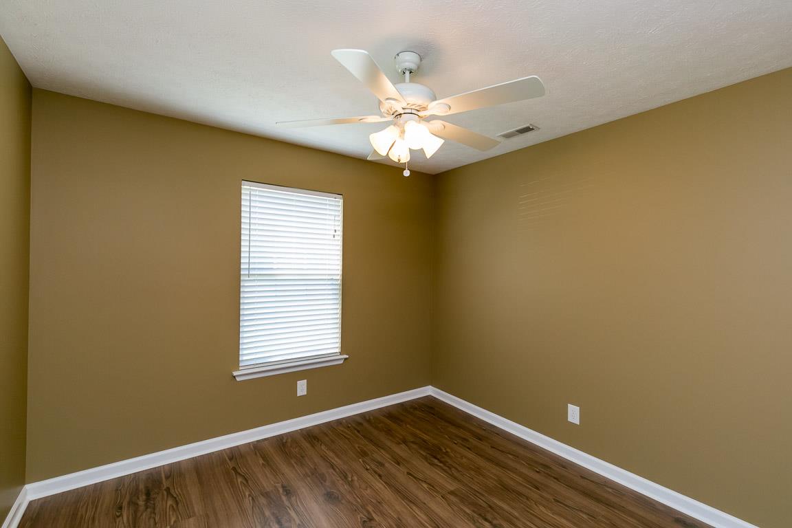 4829 Alsup Mill Road Lascassas, TN 37085 - Photo 10 of 19 a view of an empty room with window and chandelier fan