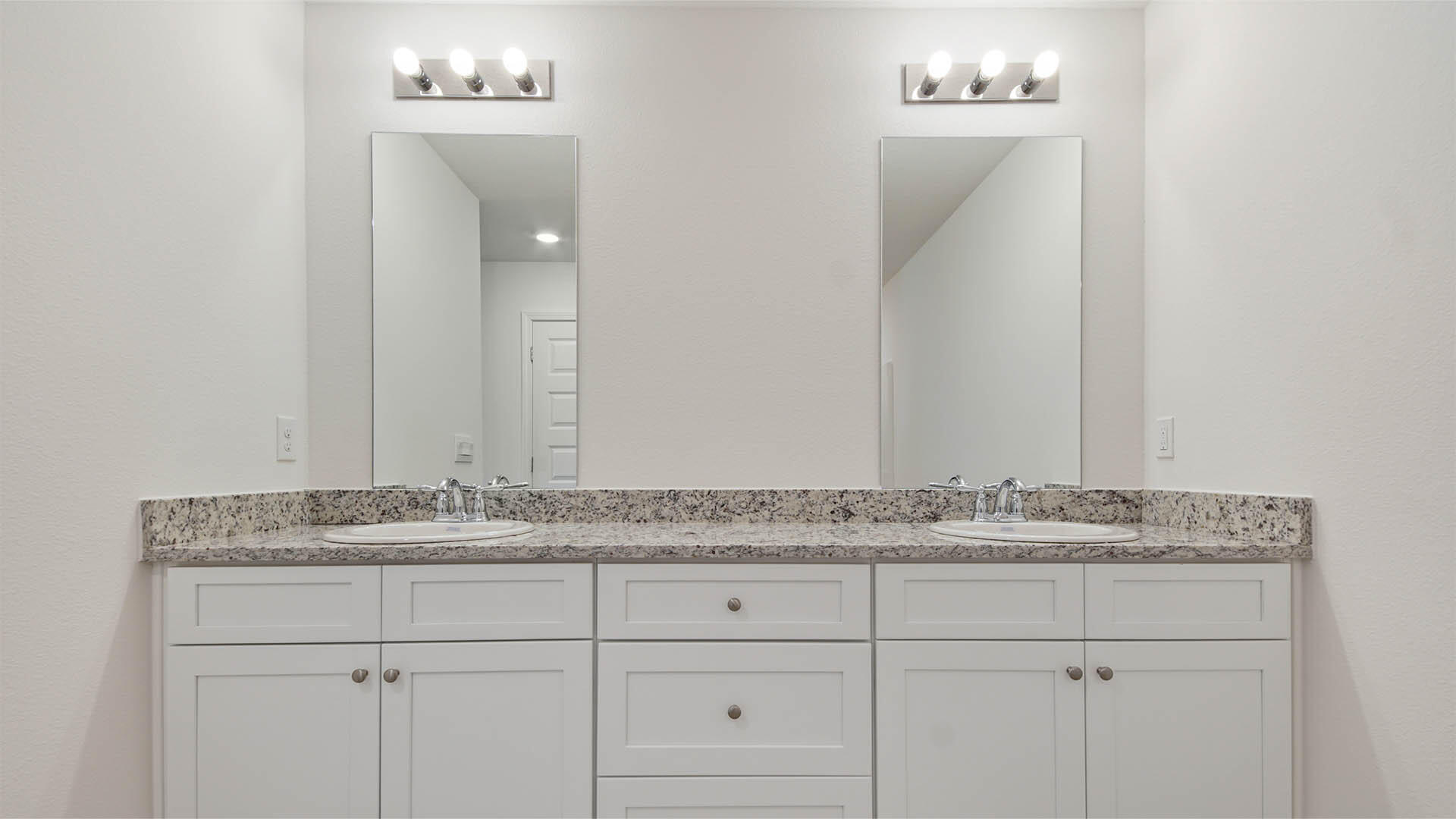 59 Foxtrail Run Freeport, FL 32439 - Photo 14 of 20 a bathroom with a sink vanity and mirror