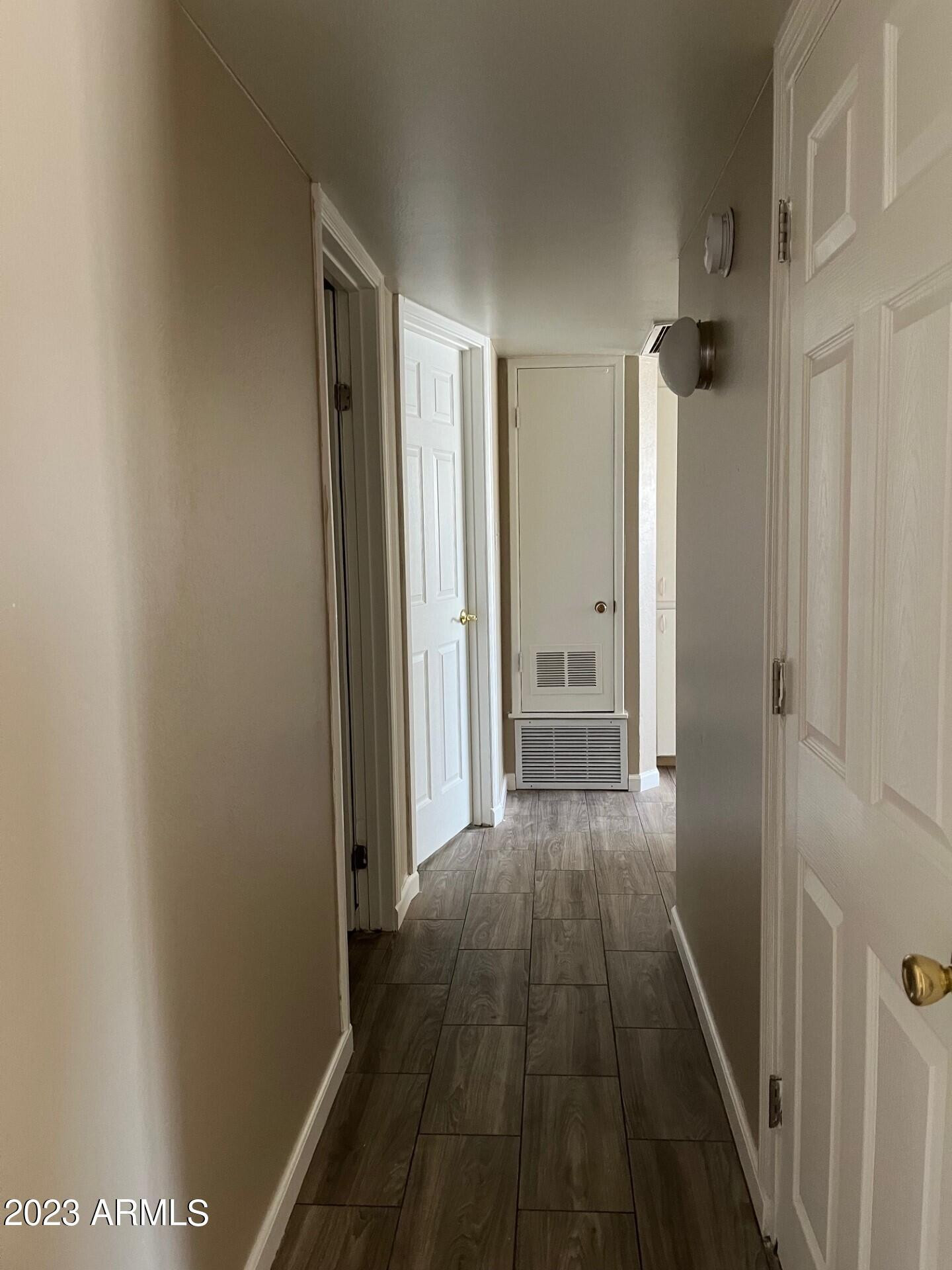 8638 North 8th Street Phoenix, AZ 85020 - Photo 9 of 12 a view of a room with wooden floor