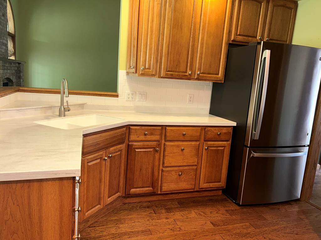 114 Oak Ridge Drive Clarion, PA 16214 - Photo 9 of 38 a kitchen with stainless steel appliances granite countertop a refrigerator and a sink