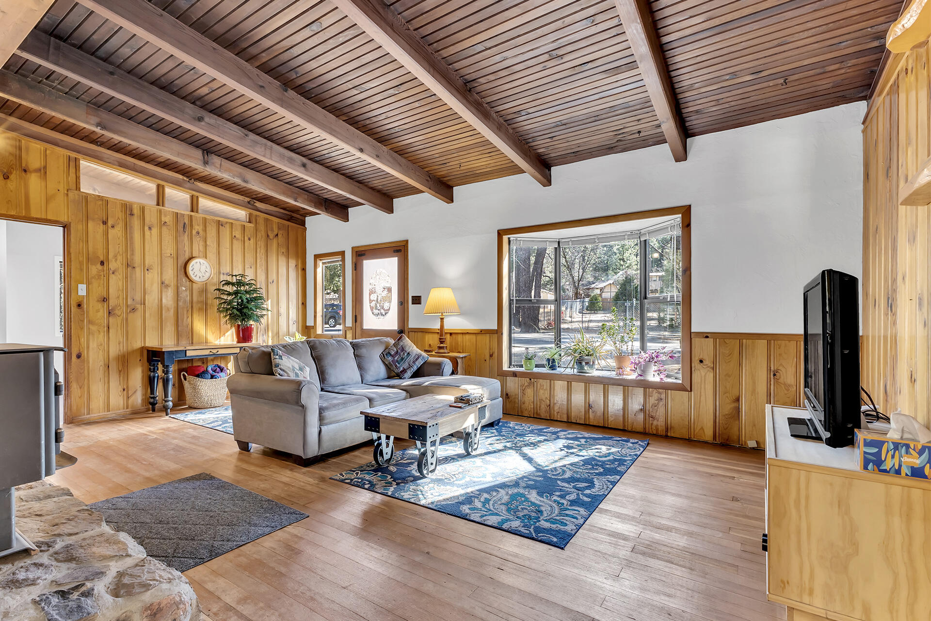 53340 Idyllbrook Drive Idyllwild, CA 92549 - Photo 15 of 68 a living room with furniture and a flat screen tv