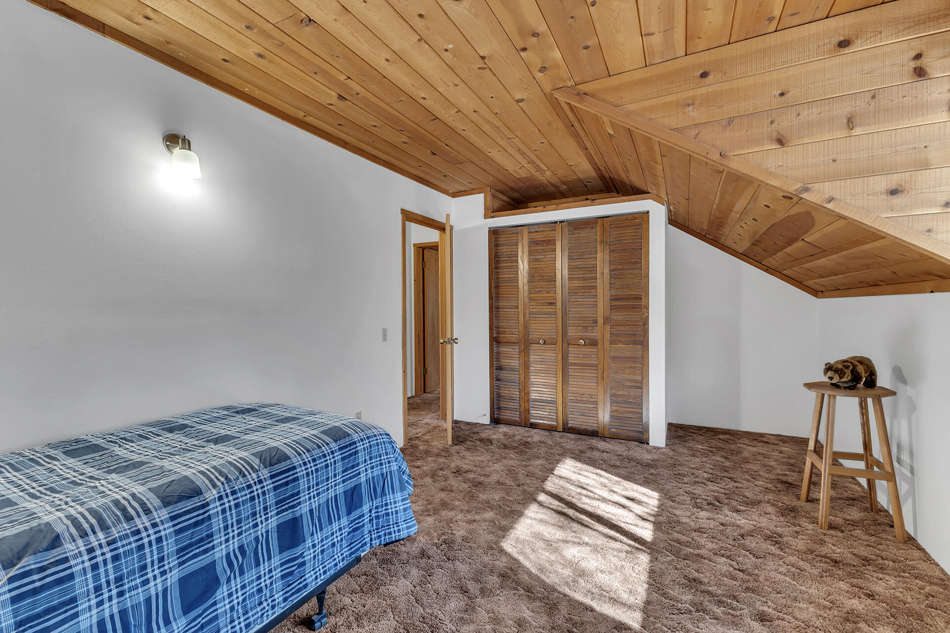 53340 Idyllbrook Drive Idyllwild, CA 92549 - Photo 52 of 68 a bedroom with a large bed and a window