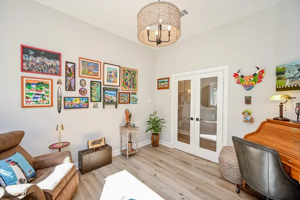 a living room with furniture and a window