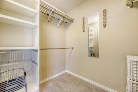a view of walk in closet with window
