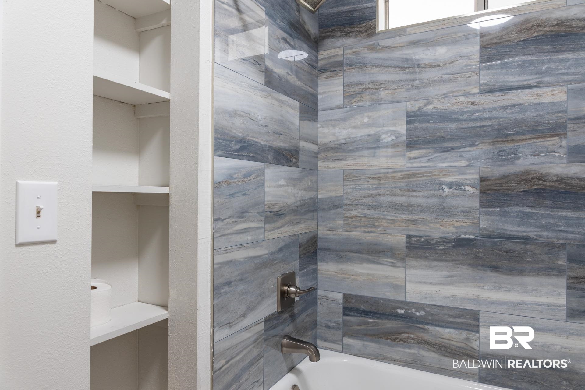 413 West Fort Morgan Road Gulf Shores, AL 36542 - Photo 17 of 29 Full bath with shower combination