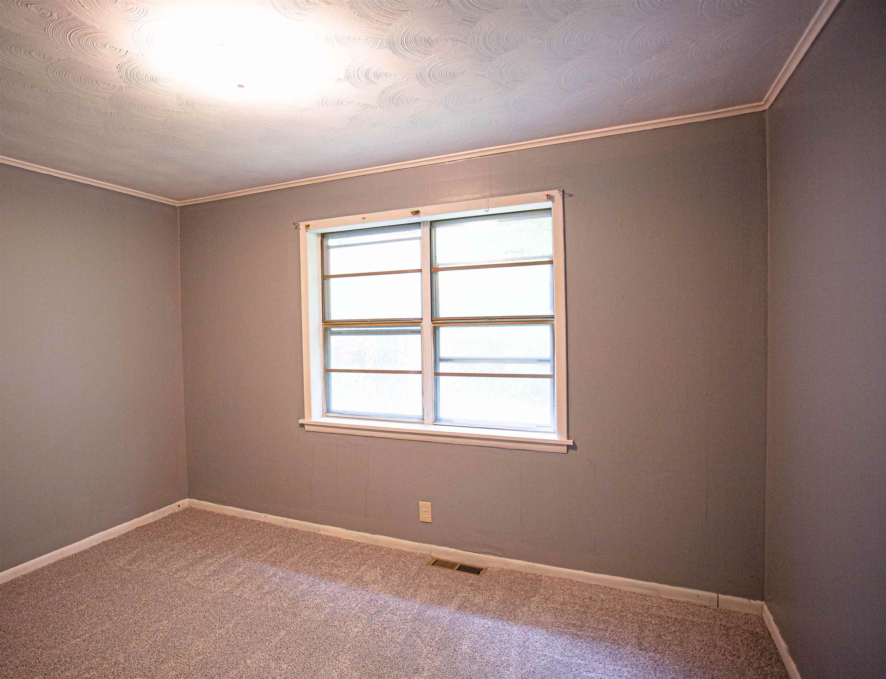 6223 Conner Whitefield Road Ripley, TN 38063 - Photo 11 of 35 an empty room with a window