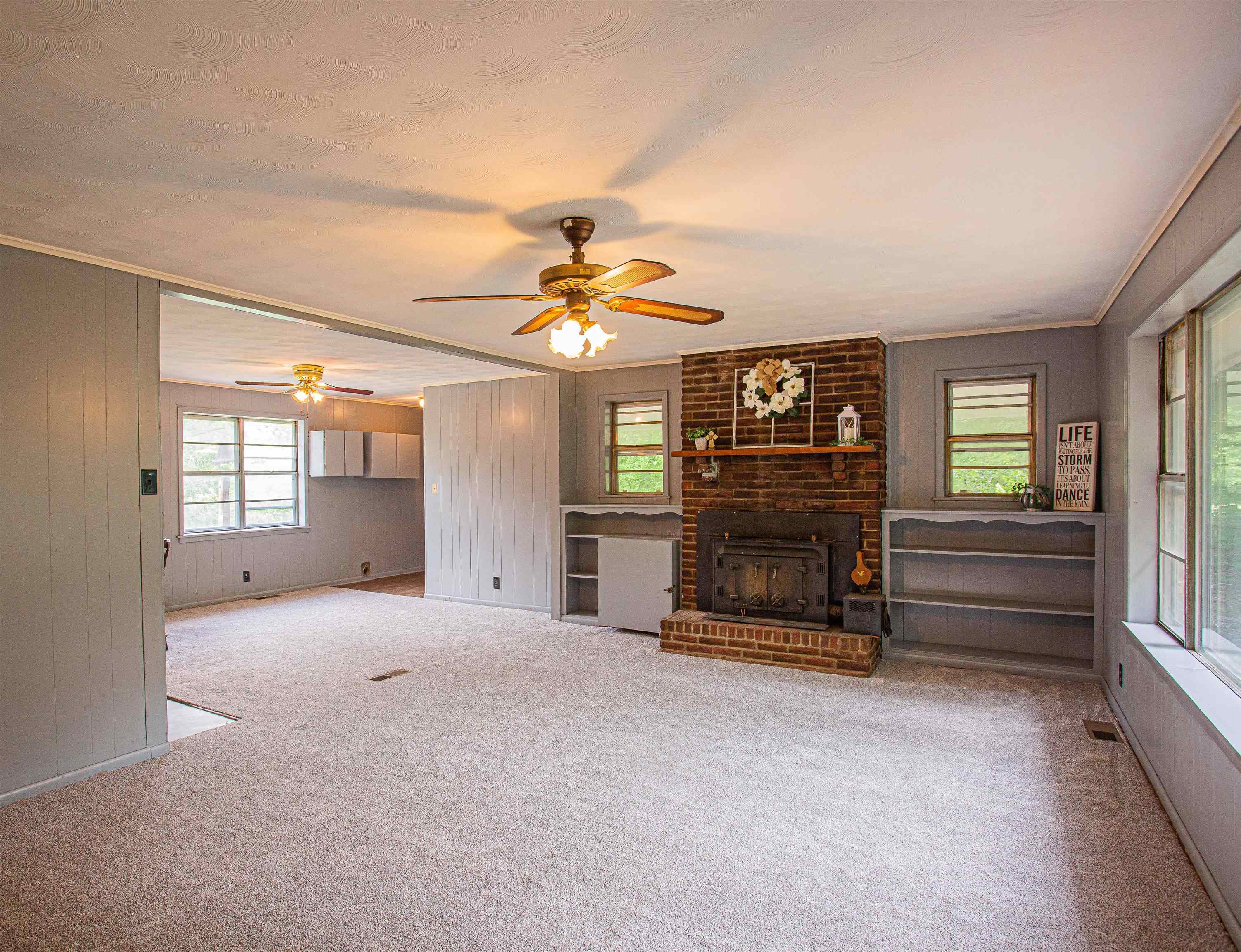 6223 Conner Whitefield Road Ripley, TN 38063 - Photo 3 of 35 wooden floor in an empty room with a window