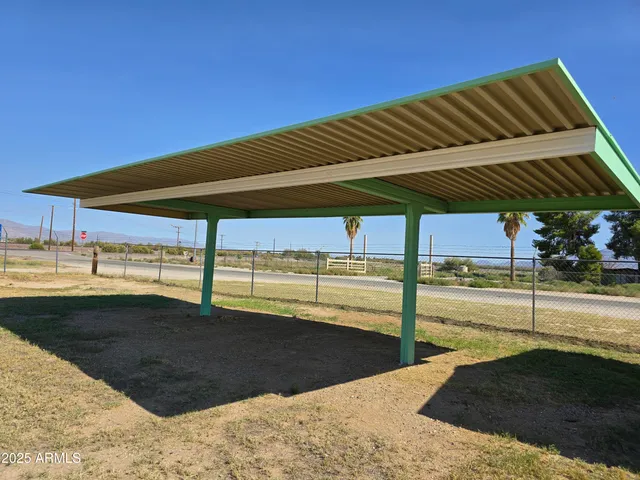 a view of a balcony with ocean view