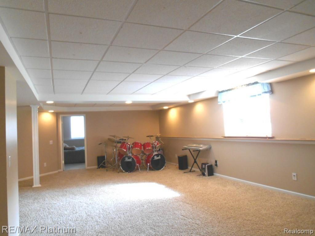 989 West Allen Road Howell, MI 48855 - Photo 35 of 44 Finished Basement