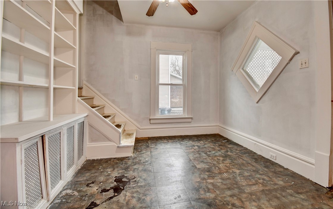 813 Dayton Street Akron, OH 44310 - Photo 14 of 29 Entrance foyer featuring stairs and ceiling fan