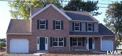 Photo is of similar property to be built. Subject property is twin on left.